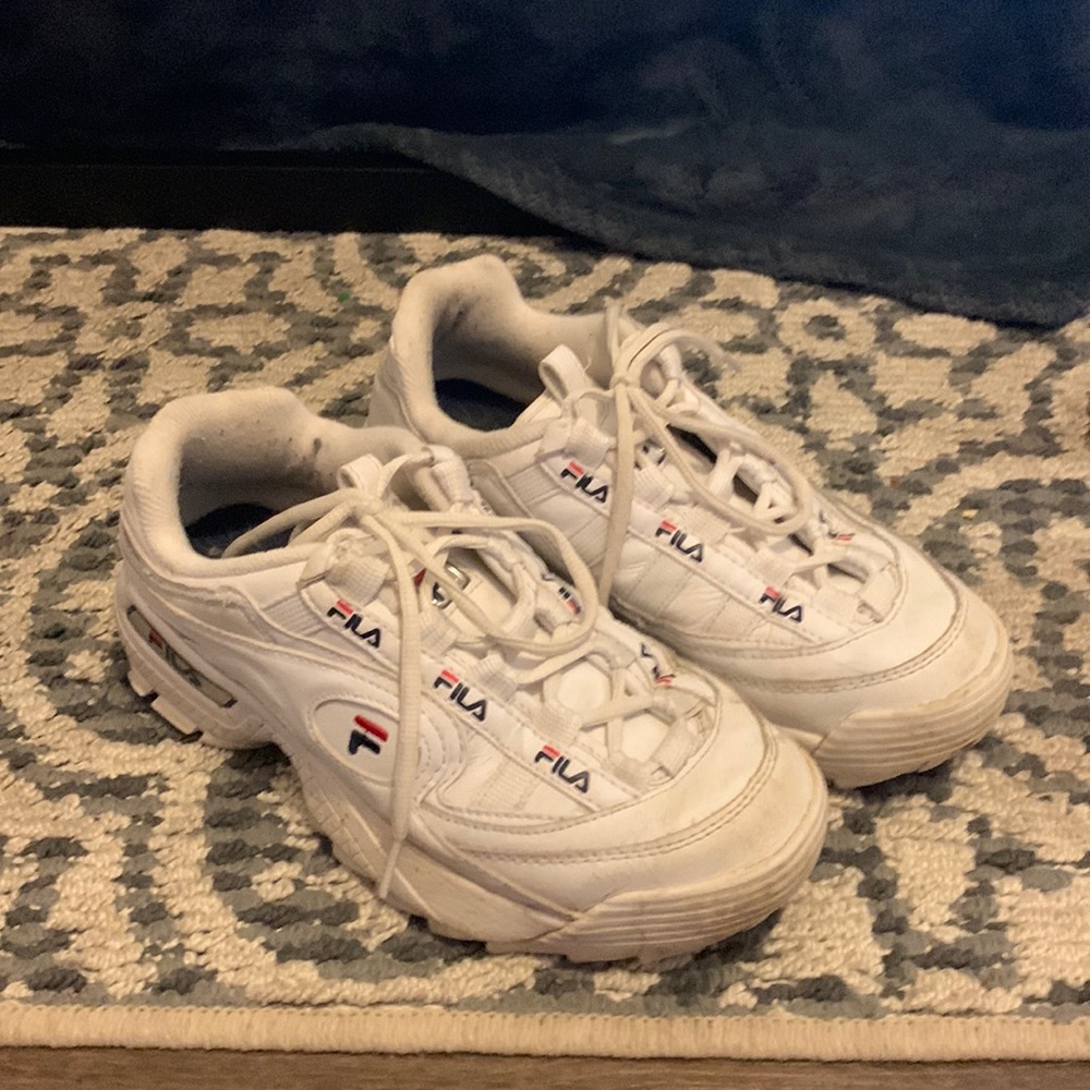 White fila shoes lifted.